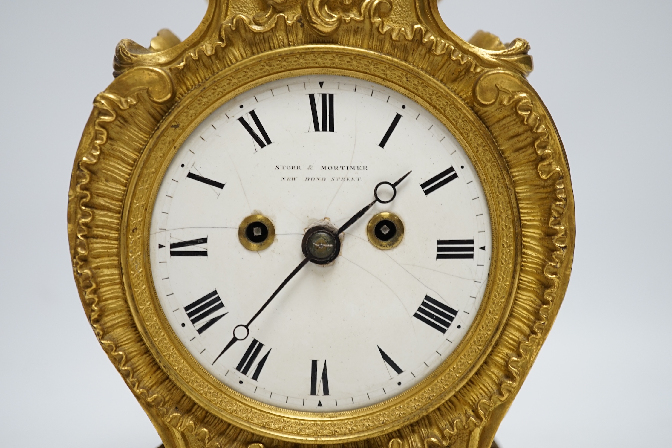 An English ormolu mantel clock, c.1835, Storr and Mortimer, New Bond St, pendulum, no key, 21cm